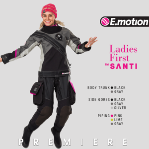 Santi Ladies First E.motion Plus Drysuit black and grey with red accents girl is wearing a santi red touque