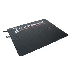 Fourth Element Changing Mat is a large textile material the lays out flat or rolls up into a tight wrapped package