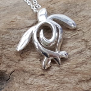 Big Blue Turtle Pendant made of sterling silver with a nice silver chain