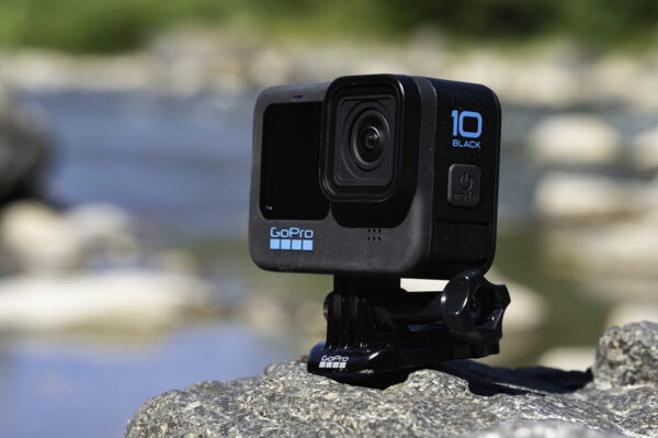 GoPro hero10 black with mount shown on a rock